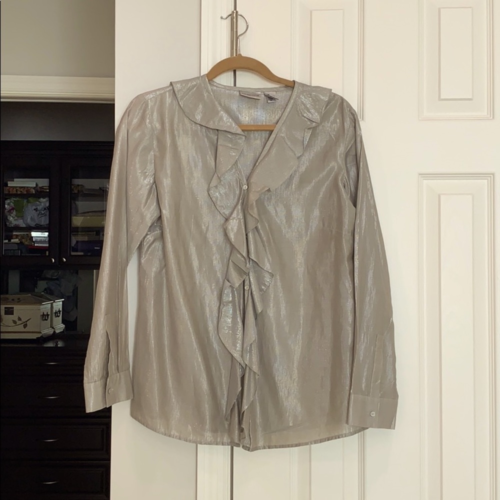 Silver metallic blouse.